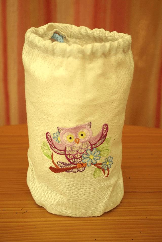 912.00/01/02/03-Sac à goûter brodé Diam 12 x 19 cm